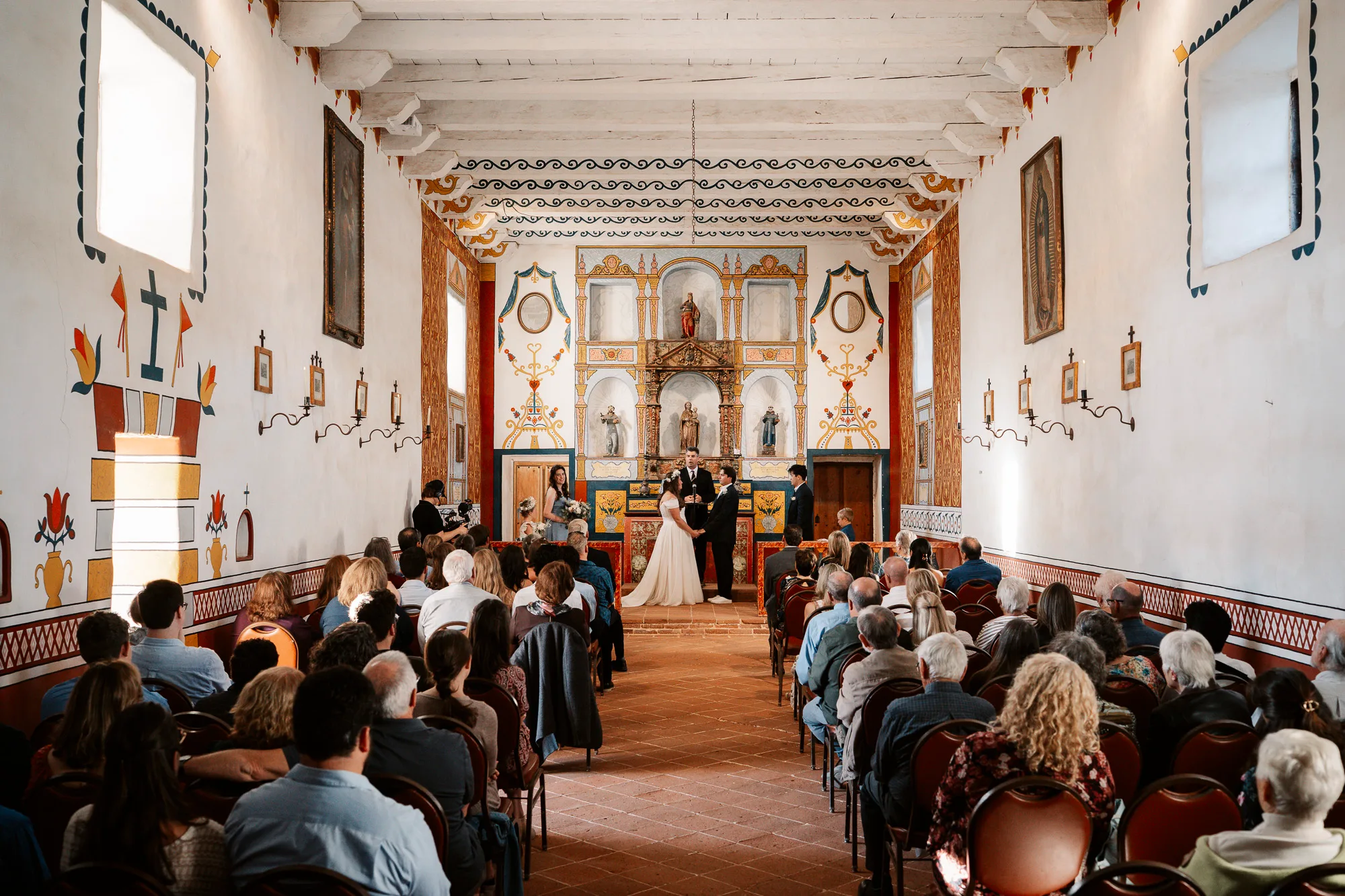 Wedding ceremony inside a historic Santa Barbara chapel